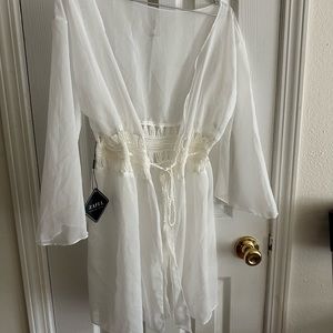 White swimsuit cover up